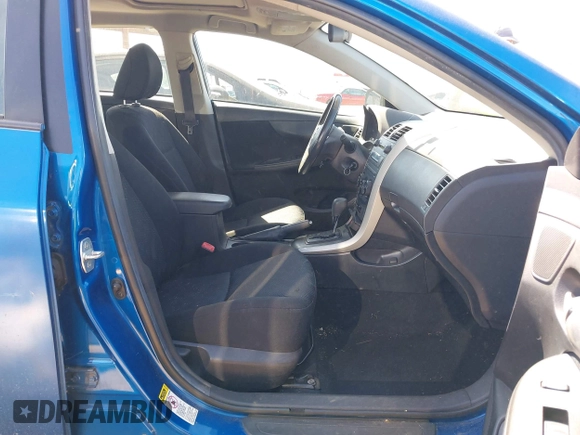 2009 Toyota Corolla with VIN 1NXBU40E49Z022648, listed as a IAAI auction lot 42042633 with 134,628 mi miles. Bid and sale history available at carsss.com. Image 5.