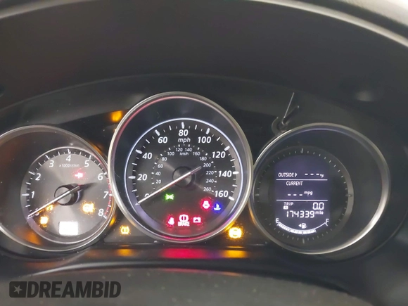 2014 Mazda CX-5 Touring with VIN JM3KE4CY4E0321055, listed as a IAAI auction lot 41613593 with 174,339 mi miles. Bid and sale history available at carsss.com. Image 7.