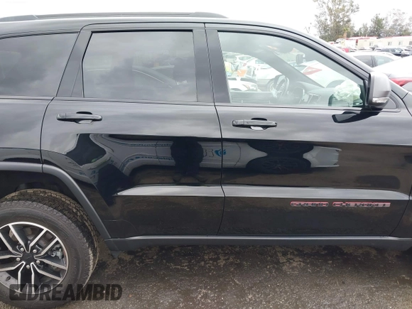 2021 Jeep Grand Cherokee Trailhawk with VIN 1C4RJFLT4MC771773, listed as a IAAI auction lot 42063954 with 17,920 mi miles and . Bid and sale history available at DreamBid. Image 13.