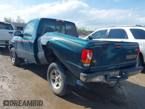 1998 Mazda B-Series Truck SX with VIN 4F4YR12C4WTM03287, listed as a IAAI auction lot 42182560 with 94,609 mi miles and . Bid and sale history available at DreamBid. Image 3.