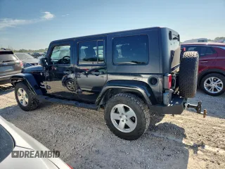 2008 Jeep Wrangler Unlimited Sahara with VIN 1J8GA59158L538460, listed as a Copart auction lot 63897295 with 335,852 mi miles and Clean title. Bid and sale history available at DreamBid. Image 2.