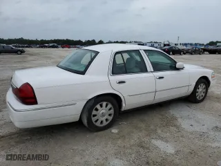 2003 Mercury Grand Marquis LS Premium with VIN 2MEHM75W53X697294, listed as a Copart auction lot 73021464 with 118,480 mi miles and Salvage Title. Bid and sale history available at carsss.com. Image 3.