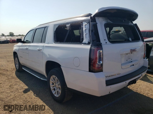 2018 GMC Yukon XL SLT with VIN 1GKS1GKC1JR321066, listed as a Copart auction lot 66789274 with 101,889 mi miles and Salvage Title. Bid and sale history available at carsss.com. Image 2.