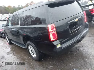 2019 Chevrolet Suburban LS with VIN 1GNSCGKC5KR321327, listed as a IAAI auction lot 41069977 with 282,308 mi miles and . Bid and sale history available at DreamBid. Image 3.