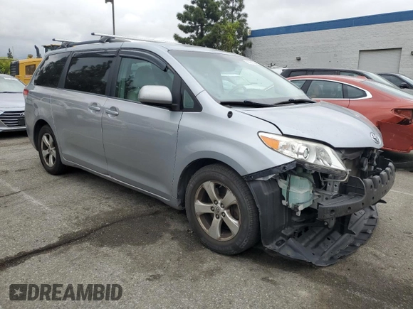 2014 Toyota Sienna LE AAS with VIN 5TDKK3DC2ES495590, listed as a Copart auction lot 53586355 with 144,337 mi miles and Salvage Title. Bid and sale history available at DreamBid. Image 4.