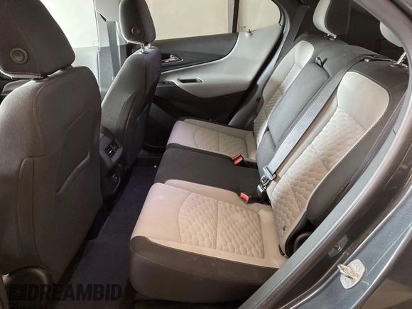 2021 Chevrolet Equinox LT z VIN 3GNAXTEV2ML379556, wystawiony jako IAAI lot #42403859 z przebiegiem 95 960 mil mil oraz . Historia ofert i sprzedaży dostępna na DreamBid. Obrazek 1.
