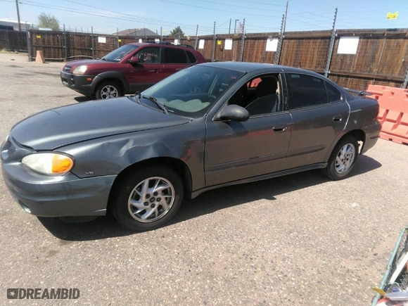 2004 Pontiac Grand Am SE1 with VIN 1G2NF52E74M507328, listed as a IAAI auction lot 42012666 with 157,263 mi miles. Bid and sale history available at carsss.com. Image 2.
