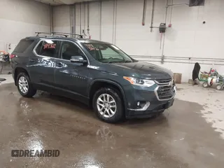 2020 Chevrolet Traverse LT with VIN 1GNEVHKW5LJ203804, listed as a IAAI auction lot 41143612 with 93,947 mi miles and . Bid and sale history available at DreamBid. Image 1.