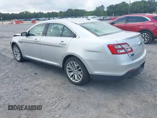 2015 Ford Taurus Limited with VIN 1FAHP2F89FG182598, listed as a IAAI auction lot 42222372 with 124,627 mi miles and . Bid and sale history available at DreamBid. Image 3.