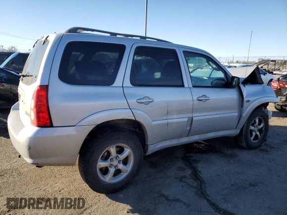 2006 Mazda Tribute S with VIN 4F2YZ04166KM17017, listed as a Copart auction lot 42969365 with 217,984 mi miles and Salvage Title. Bid and sale history available at DreamBid. Image 3.