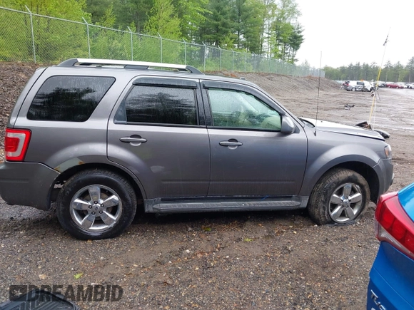 2010 Ford Escape Limited z VIN 1FMCU9EGXAKA70120, wystawiony jako IAAI lot #42330489 z przebiegiem 179 604 mil mil oraz . Historia ofert i sprzedaży dostępna na DreamBid. Obrazek 13.