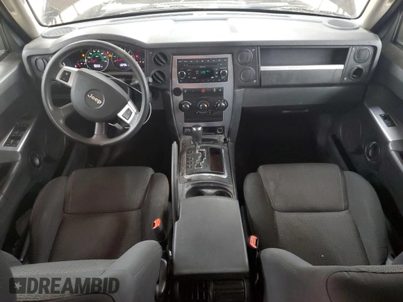 2008 Jeep Commander Sport z VIN 1J8HG48K08C135414, wystawiony jako Copart lot #52410675 z przebiegiem 200 480 mil mil oraz Szkoda całkowita • Salvage title. Historia ofert i sprzedaży dostępna na DreamBid. Obrazek 8.