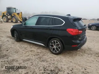 2021 BMW X1 xDrive28i with VIN WBXJG9C07M5T06155, listed as a Copart auction lot 84222754 with 18,466 mi miles and Salvage Title. Bid and sale history available at carsss.com. Image 2.