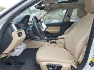 2017 BMW 3 Series 320i xDrive with VIN WBA8E5G5XHNU22436, listed as a Copart auction lot 52702805 with 74,008 mi miles and Salvage title. Bid and sale history available at DreamBid. Image 7.