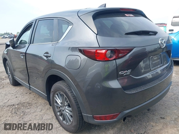 2017 Mazda CX-5 Touring z VIN JM3KFBCL4H0178747, wystawiony jako IAAI lot #42041380 z przebiegiem 112 083 mil mil oraz . Historia ofert i sprzedaży dostępna na DreamBid. Obrazek 3.