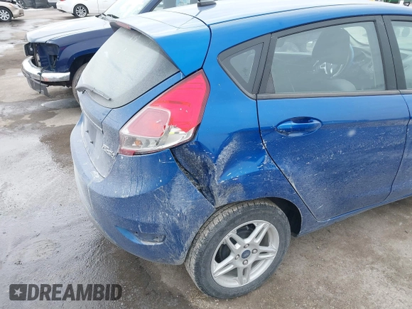 2019 Ford Fiesta SE with VIN 3FADP4EJ2KM121091, listed as a IAAI auction lot 41595764 with 98,669 mi miles. Bid and sale history available at carsss.com. Image 6.