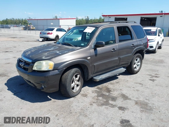 2006 Mazda Tribute i with VIN 4F2YZ02Z36KM29148, listed as a IAAI auction lot 42044163 with 175,786 mi miles and . Bid and sale history available at carsss.com. Image 2.