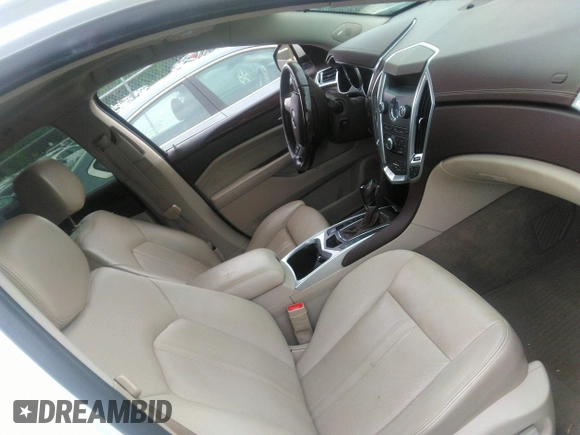 2012 Cadillac SRX Performance Collection z VIN 3GYFNBE32CS653172, wystawiony jako IAAI lot #42287435 z przebiegiem 161 065 mil mil oraz . Historia ofert i sprzedaży dostępna na DreamBid. Obrazek 5.