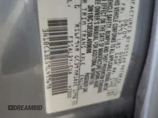 2009 Nissan Versa S z VIN 3N1BC13E59L499698, wystawiony jako Copart lot #58242235 z przebiegiem 169 239 mil mil oraz Czysty tytuł • Clean title. Historia ofert i sprzedaży dostępna na DreamBid. Obrazek 12.