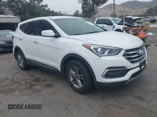 2018 Hyundai Santa Fe Sport 2.4L with VIN 5XYZT3LB0JG562814, listed as a IAAI auction lot 42047560 with 113,543 mi miles. Bid and sale history available at carsss.com. Image 1.