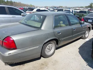 2001 Mercury Grand Marquis LS with VIN 2MEFM75W21X664449, listed as a IAAI auction lot 41898463 with 290,047 mi miles and . Bid and sale history available at DreamBid. Image 13.