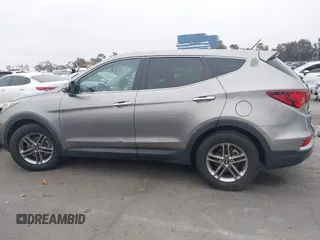 2018 Hyundai Santa Fe 2.4L with VIN 5XYZT3LB7JG569517, listed as a IAAI auction lot 42141100 with 57,854 mi miles and . Bid and sale history available at DreamBid. Image 15.