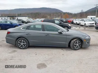 2022 Hyundai Sonata Hybrid Blue with VIN KMHL24JJ2NA048439, listed as a IAAI auction lot 40942477 with 64,855 mi miles. Bid and sale history available at carsss.com. Image 14.