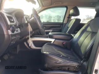 2017 Nissan Titan Pro-4X z VIN 1N6BA1F42HN571085, wystawiony jako Copart lot #49859795 z przebiegiem 163 835 mil mil oraz Tytuł czysty. Historia ofert i sprzedaży dostępna na DreamBid. Obrazek 7.