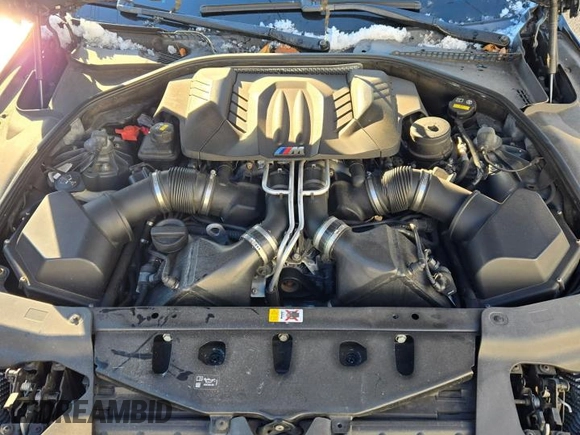 2016 BMW M6 z VIN WBS6E9C57GG437138, wystawiony jako Copart lot #45290525 z przebiegiem 58 645 mil mil oraz Tytuł czysty. Historia ofert i sprzedaży dostępna na DreamBid. Obrazek 7.
