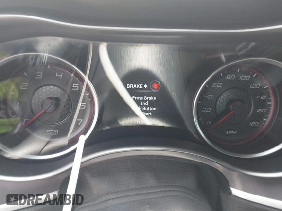 2019 Dodge Charger Scat Pack with VIN 2C3CDXGJ2KH633854, listed as a IAAI auction lot 42212517 with 74,285 mi miles and . Bid and sale history available at DreamBid. Image 7.
