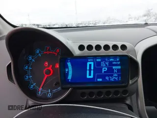 2014 Chevrolet Sonic LS with VIN 1G1JA6SH6E4139131, listed as a IAAI auction lot 41727625 with 97,241 mi miles and . Bid and sale history available at DreamBid. Image 7.