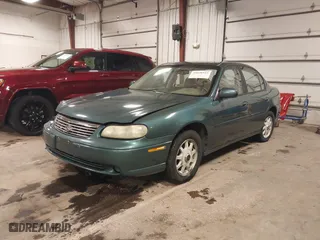 1998 Chevrolet Malibu LS with VIN 1G1NE52M6W6104642, listed as a IAAI auction lot 41636923 with 116,944 mi miles. Bid and sale history available at carsss.com. Image 18.