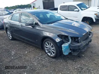 2017 Ford Fusion Hybrid SE z VIN 3FA6P0LU3HR260558, wystawiony jako IAAI lot #42657176 z przebiegiem 161 183 mil mil oraz . Historia ofert i sprzedaży dostępna na DreamBid. Obrazek 1.