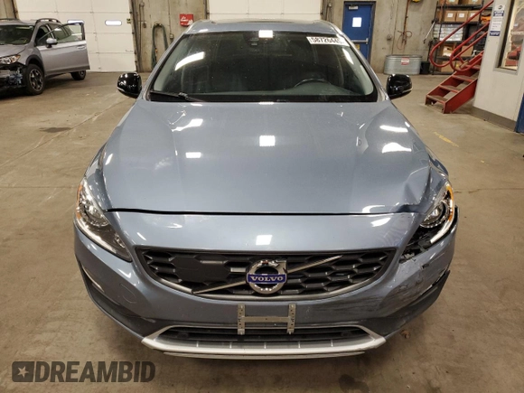 2018 Volvo V60 z VIN YV440MWK4J2056365, wystawiony jako Copart lot #58726445 z przebiegiem 42 542 mil mil oraz Szkoda całkowita • Salvage title. Historia ofert i sprzedaży dostępna na DreamBid. Obrazek 5.