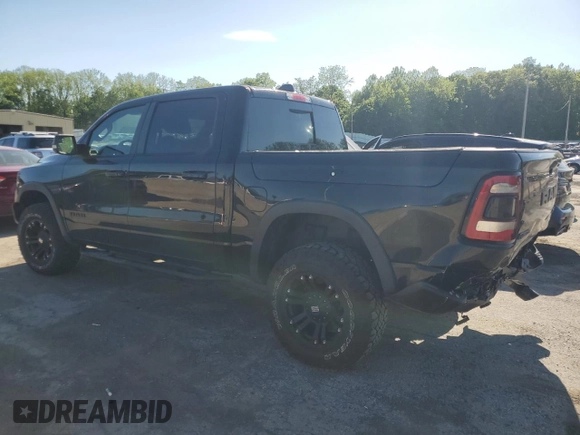 2019 Ram 1500 Rebel z VIN 1C6SRFLT5KN811457, wystawiony jako Copart lot #57034285 z przebiegiem 84 077 mil mil oraz Szkoda całkowita • Salvage title. Historia ofert i sprzedaży dostępna na DreamBid. Obrazek 2.
