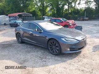 2017 Tesla Model S 60 z VIN 5YJSA1E19HF187782, wystawiony jako IAAI lot #42394814 z przebiegiem 80 302 mil mil oraz . Historia ofert i sprzedaży dostępna na DreamBid. Obrazek 1.