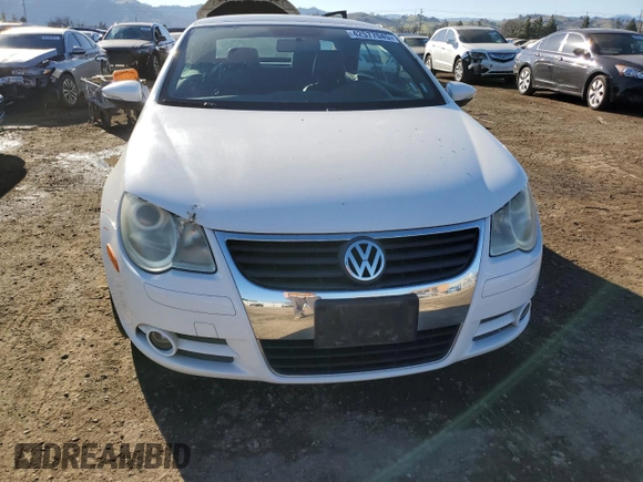 2009 Volkswagen Eos Komfort с VIN WVWAA71F79V011641, выставлен на аукционе Copart как лот 42577045 с пробегом 66 543 миль миль и Списание • Salvage title. История ставок и продаж доступна на DreamBid. Изображение 5.