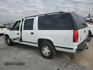 1996 Chevrolet Suburban with VIN 3GNEC16R5TG149147, listed as a Copart auction lot 84827204 with 320,305 mi miles and Salvage title. Bid and sale history available at DreamBid. Image 2.