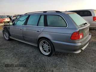 2002 BMW 5 Series 525iAT with VIN WBADS434X2GE10428, listed as a Copart auction lot 83689954 with 183,737 mi miles and Salvage Title. Bid and sale history available at carsss.com. Image 2.