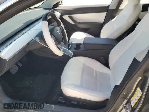 2020 Tesla Model 3 Long Range with VIN 5YJ3E1EBXLF668795, listed as a Copart auction lot 49913515 with 82,962 mi miles and Salvage Title. Bid and sale history available at DreamBid. Image 7.