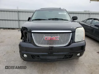 2009 GMC Yukon SLT 4SB with VIN 1GKFK33009R280856, listed as a Copart auction lot 51522635 with 265,941 mi miles and Salvage Title. Bid and sale history available at DreamBid. Image 5.