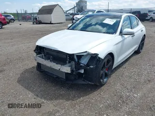 2021 Genesis G70 3.3T with VIN KMTG34LEXMU076278, listed as a IAAI auction lot 41976406 with 44,684 mi miles and . Bid and sale history available at DreamBid. Image 18.