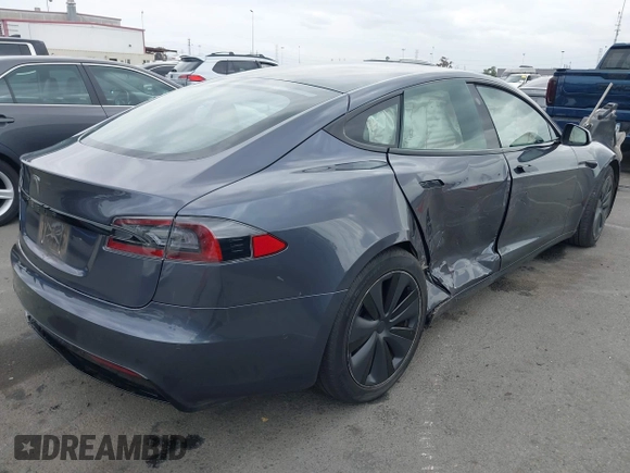 2021 Tesla Model S Long Range с VIN 5YJSA1E57MF441387, выставлен на аукционе IAAI как лот 42034307 с пробегом Не указан миль и . История ставок и продаж доступна на DreamBid. Изображение 4.