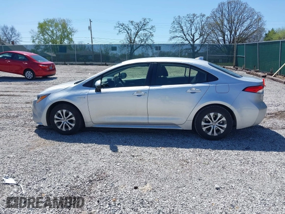 2021 Toyota Corolla Hybrid LE with VIN JTDEAMDE5MJ022110, listed as a IAAI auction lot 41912920 with 59,198 mi miles. Bid and sale history available at carsss.com. Image 14.
