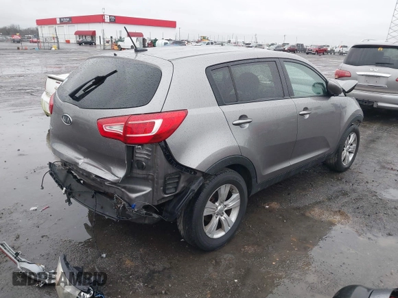 2012 Kia Sportage LX with VIN KNDPB3A29C7273864, listed as a IAAI auction lot 41543862 with 140,897 mi miles. Bid and sale history available at carsss.com. Image 4.