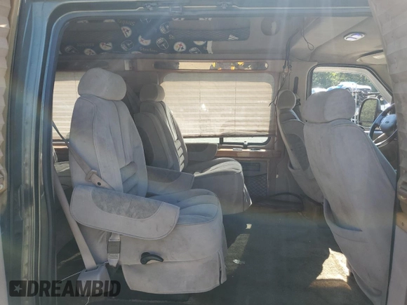 2002 Ford Econoline Cargo with VIN 1FDRE14W62HB15506, listed as a Copart auction lot 74686494 with 253,296 mi miles and Salvage Title. Bid and sale history available at DreamBid. Image 11.
