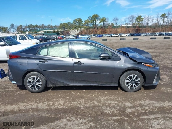 2018 Toyota Prius Prime Plus with VIN JTDKARFP3J3096141, listed as a IAAI auction lot 41822905 with 61,159 mi miles. Bid and sale history available at carsss.com. Image 12.