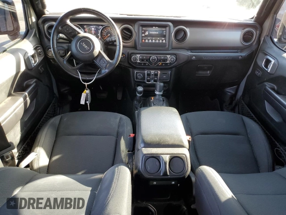 2020 Jeep Wrangler Unlimited Willys with VIN 1C4HJXDG5LW348507, listed as a Copart auction lot 77000574 with 57,056 mi miles and Salvage title. Bid and sale history available at DreamBid. Image 8.
