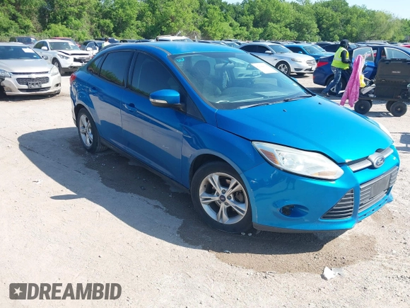 2014 Ford Focus SE with VIN 1FADP3F29EL122925, listed as a IAAI auction lot 42044004 with 216,490 mi miles. Bid and sale history available at carsss.com. Image 1.