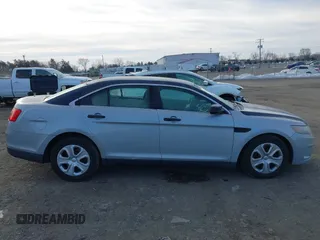 2014 Ford Police Interceptor with VIN 1FAHP2MK6EG153699, listed as a IAAI auction lot 41397473 with 174,452 mi miles and . Bid and sale history available at DreamBid. Image 13.